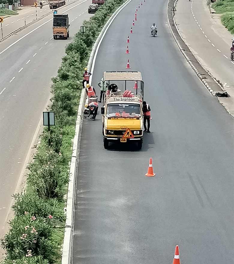 Marking truck and crew on a divided highway